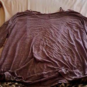 A purplish pink short sleeve shirt